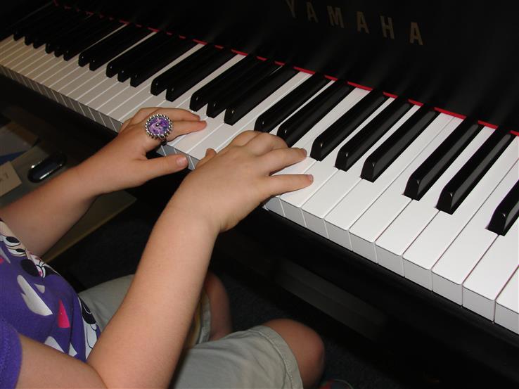 Student of Lily Music Studio playing piano in Jacksonville, FL